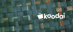 woven basket with the Koodai logo on top